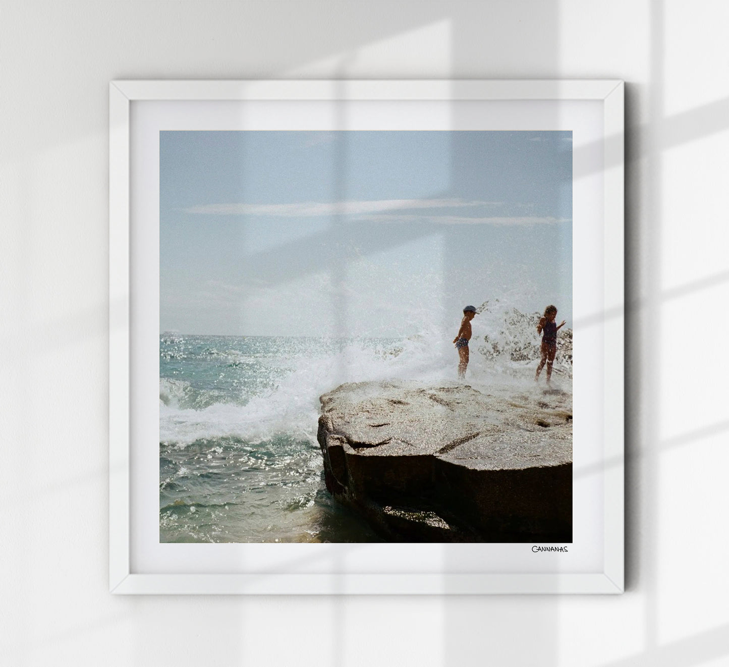 Children playing on the beach by Cannanas