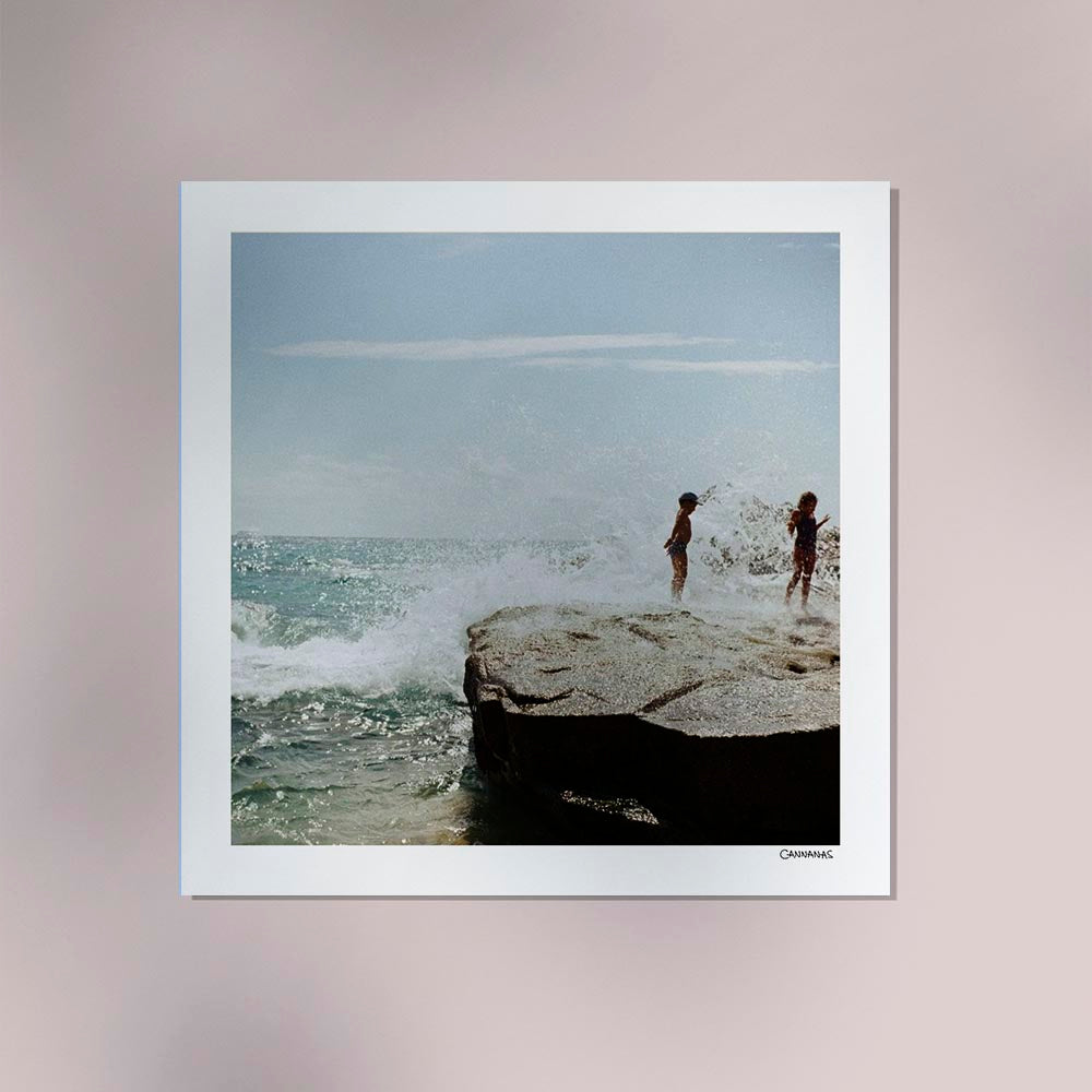 Children playing on the beach by Cannanas